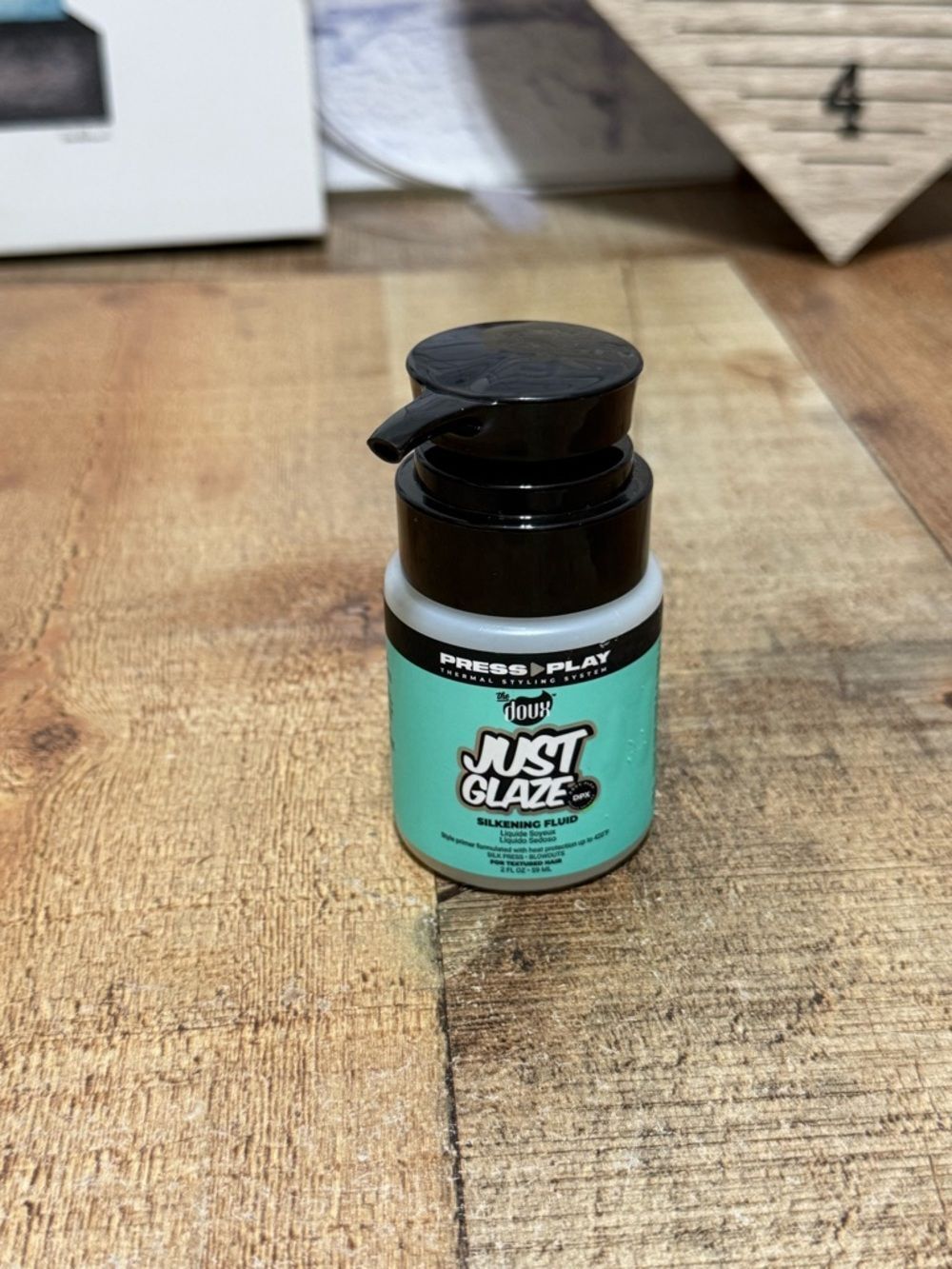 The doux JUST GLAZE SILKENING FLUID 2OZ